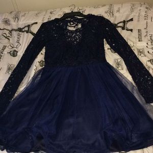 a beautiful navy blue homecoming dress